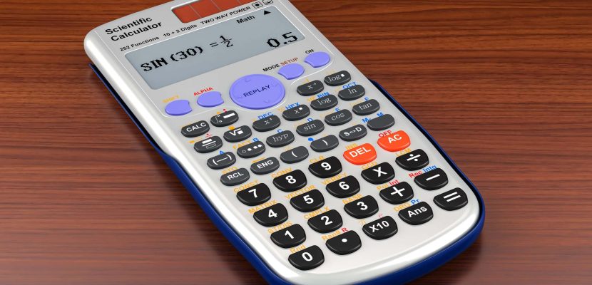 Scientific calculator on the wooden table. 3D rendering